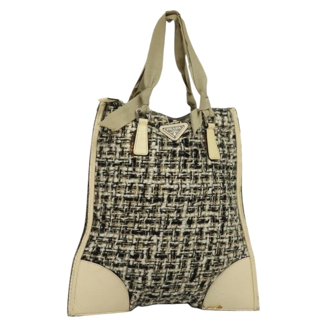 PRADA Beige Black Silver Wool Hand Bag Made in Italy Auth: PRADA Beige Black Silver Wool Hand Bag Made in Italy Auth This PRADA Hand Bag is crafted from durable wool in a chic combination of beige, black, and silver. The stylish design features a handle drop 