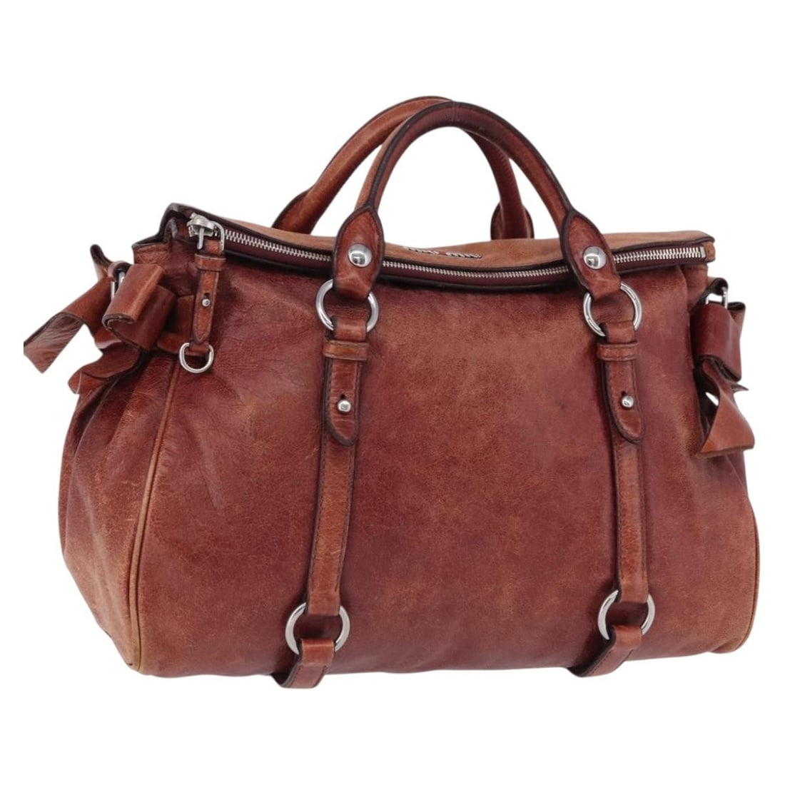 Miu Miu Red Leather Handbag with Silver Tone Hardware: Miu Miu Red Leather Handbag with Silver Tone Hardware Red leather Miu Miu handbag for women with silver-tone detailing. This heavily used bag was made in Turkey and shows noticeable wear throughout, i