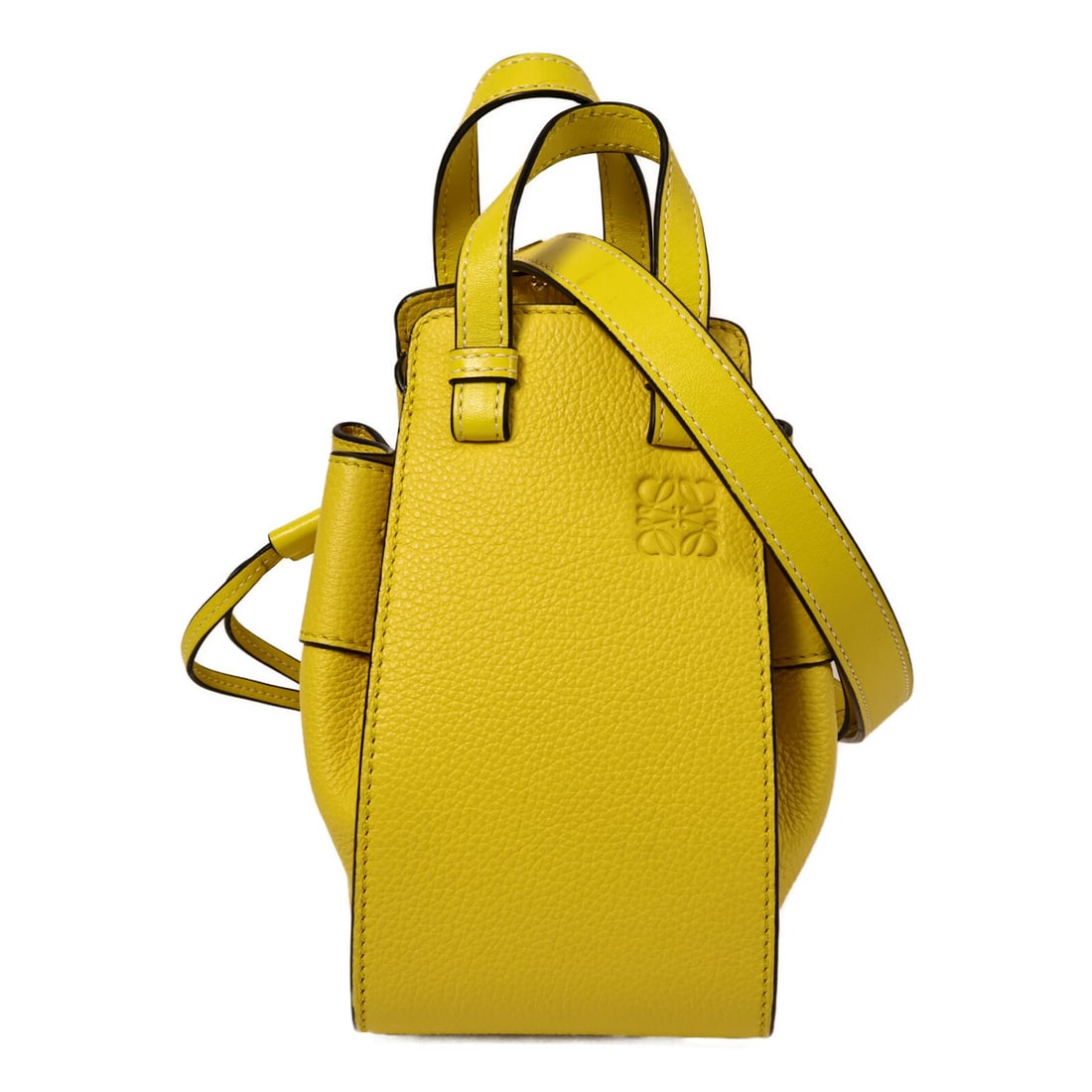 LOEWE Hammock Mini Yellow Calfskin 2 Way Shoulder Bag: LOEWE Hammock Mini Yellow Calfskin 2 Way Shoulder Bag LOEWE Hammock Mini 2-way shoulder bag in yellow calfskin leather. This women's bag features an interior with two open pockets and includes a shoul