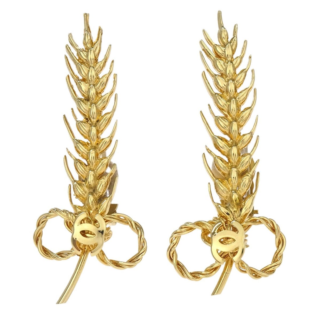 Chanel CC Wheat Motif Gold Tone Clip On Earrings: Chanel CC Wheat Motif Gold Tone Clip On Earrings Gold-tone Chanel clip-on earrings in a CC shape with an Ear of Wheat design and logo theme. The earrings are described as being in good condition with 