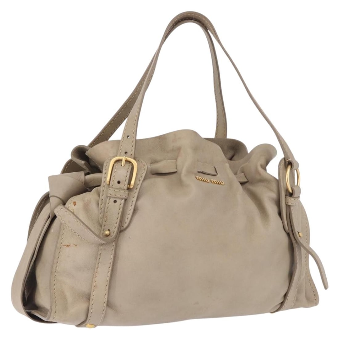 Miu Miu Beige Leather Tote Bag with Gold Tone Hardware: Miu Miu Beige Leather Tote Bag with Gold Tone Hardware Beige leather tote bag with gold-tone accents. This women's bag is a heavily used item with visible wear throughout, including loss of shape, rub