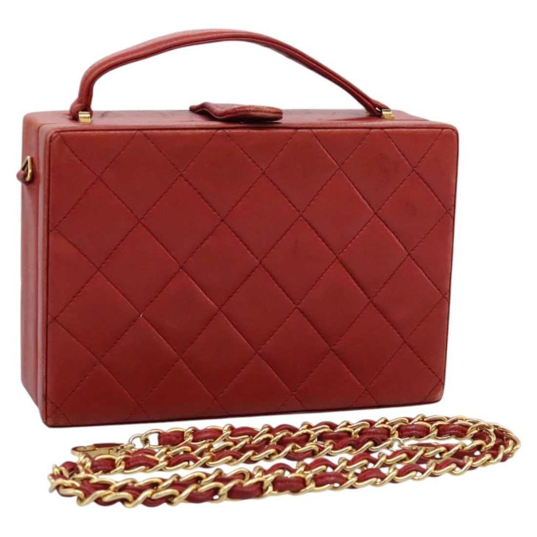 Chanel Red Lambskin Matelasse Handbag with Shoulder Strap and CC Logo: Chanel Red Lambskin Matelasse Handbag with Shoulder Strap and CC Logo This CHANEL Matelasse handbag features a classic 2-way design crafted from red lambskin leather. Designed for women, it includes a