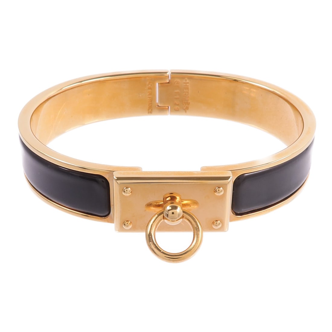 Hermes Clic Anneau black enamel bracelet with metal GHW: Hermes Clic Anneau black enamel bracelet with metal GHW Hermes Clic Anneau bangle in black enamel and metal. This women's bracelet includes a storage box and storage bags. Condition is AB: Very Good. 