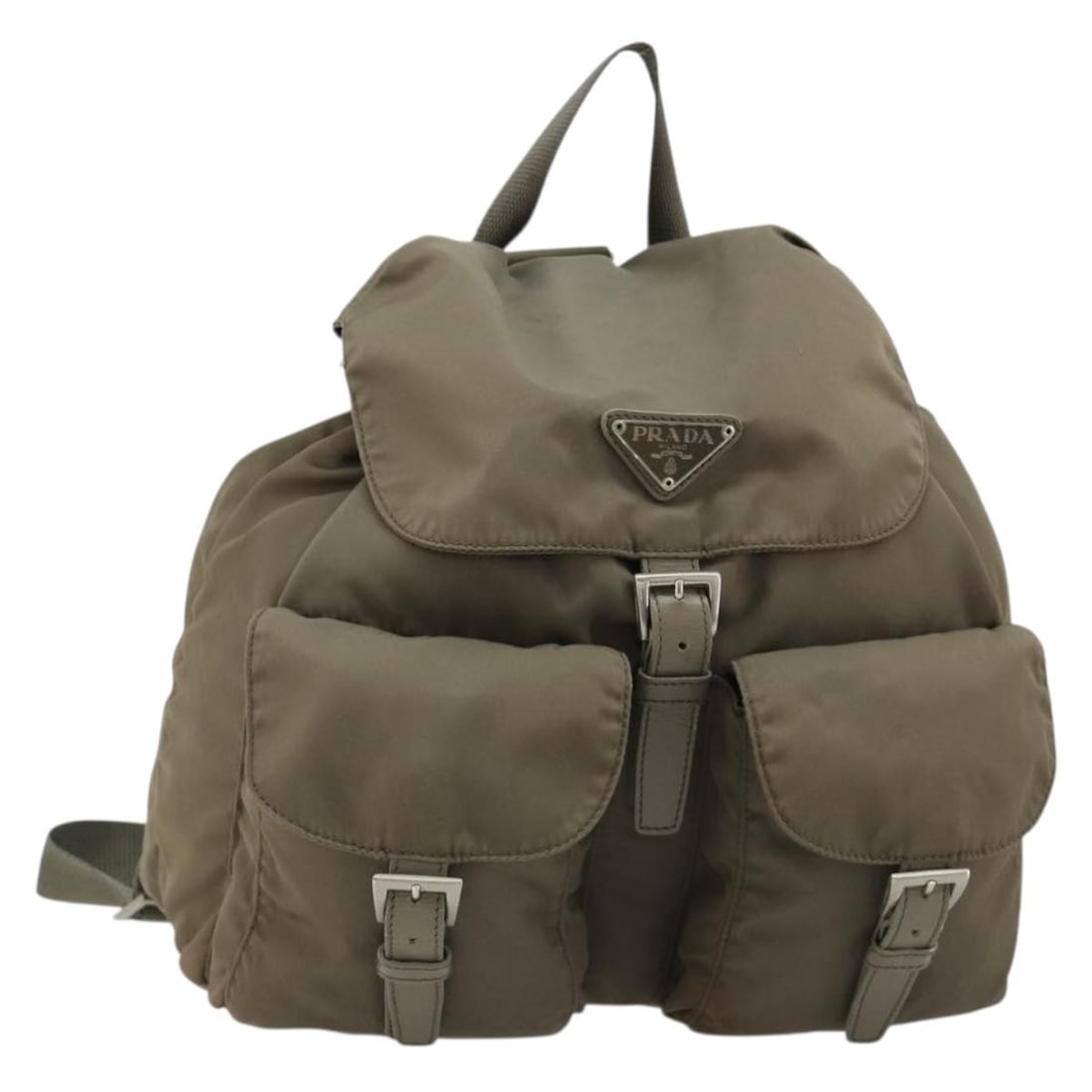 Prada Gray Silver Nylon Women Backpack Italy: Prada Gray Silver Nylon Women Backpack Italy This PRADA backpack features a gray and silver nylon exterior, crafted in Italy. The bag is designed for women and offers a practical size with approximate