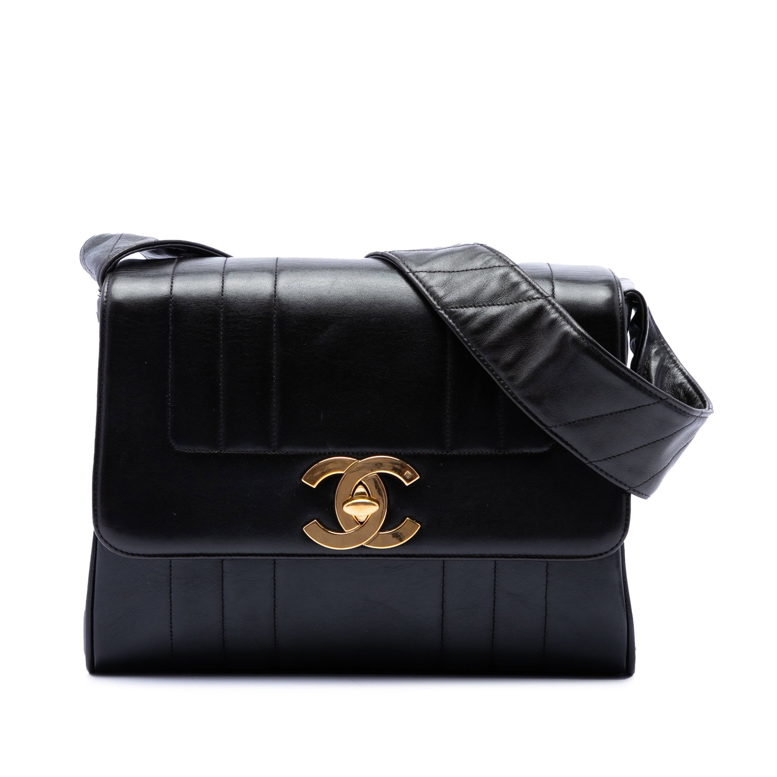 Chanel Vertical Quilt Flap Bag in Black Lambskin: Chanel Vertical Quilt Flap Bag in Black Lambskin Chanel Vertical Quilt Lambskin Flap bag in black leather with a quilted body, flat leather strap, and front flap with CC turn-lock closure. The interio