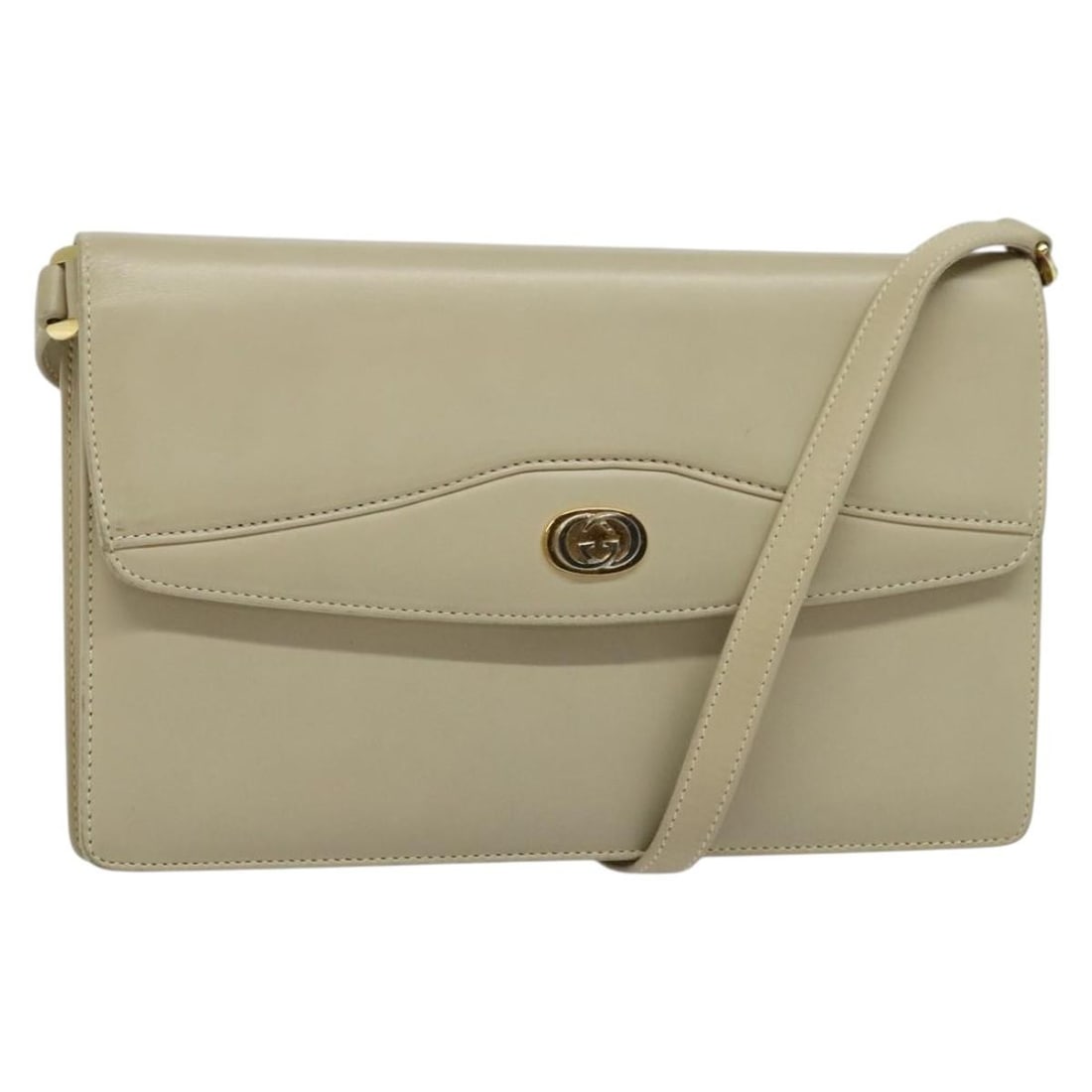 Gucci Vintage Interlocking G Flap Shoulder Bag Beige Leather: Gucci Vintage Interlocking G Flap Shoulder Bag Beige Leather This Gucci Vintage Interlocking G Flap Shoulder Bag is crafted from beige leather and features a timeless design with an interlocking G log