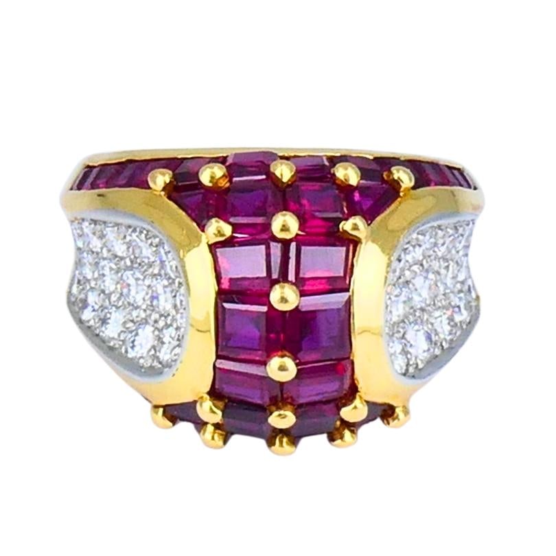 Oscar Heyman Ruby Diamond Cocktail Ring in 18k Gold Platinum: Oscar Heyman Ruby Diamond Cocktail Ring in 18k Gold Platinum Vintage Oscar Heyman cocktail ring crafted in 18k yellow gold and platinum, featuring rubies and diamonds in a bold geometric design. Three