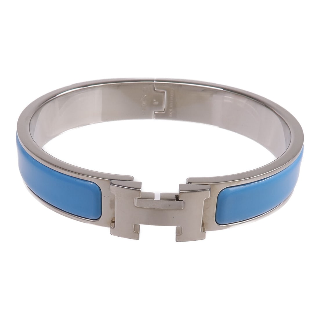 Hermes Clic H Enamel Bracelet Blue Silver Tone: Hermes Clic H Enamel Bracelet Blue Silver Tone Hermes Clic H bracelet in blue and silver enamel and metal. It comes with storage box and storage bags. Condition is AB: Very Good. Specifications Brand: