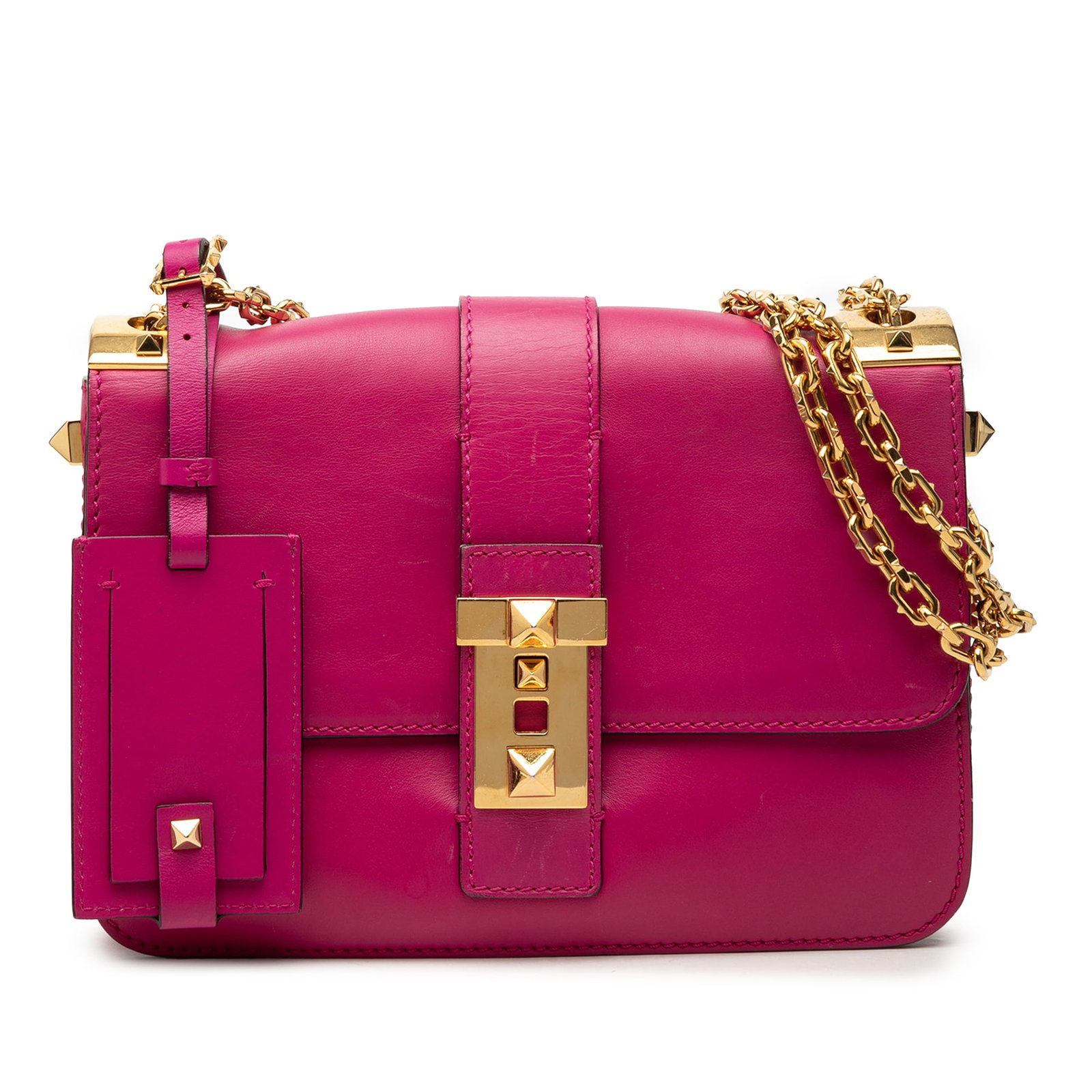 Valentino B Rockstud Pink Leather Shoulder Bag with Chain Strap: Valentino B Rockstud Pink Leather Shoulder Bag with Chain Strap Valentino B Rockstud flap shoulder bag in pink leather with a front flap and push lock closure. The bag features a gold tone chain strap