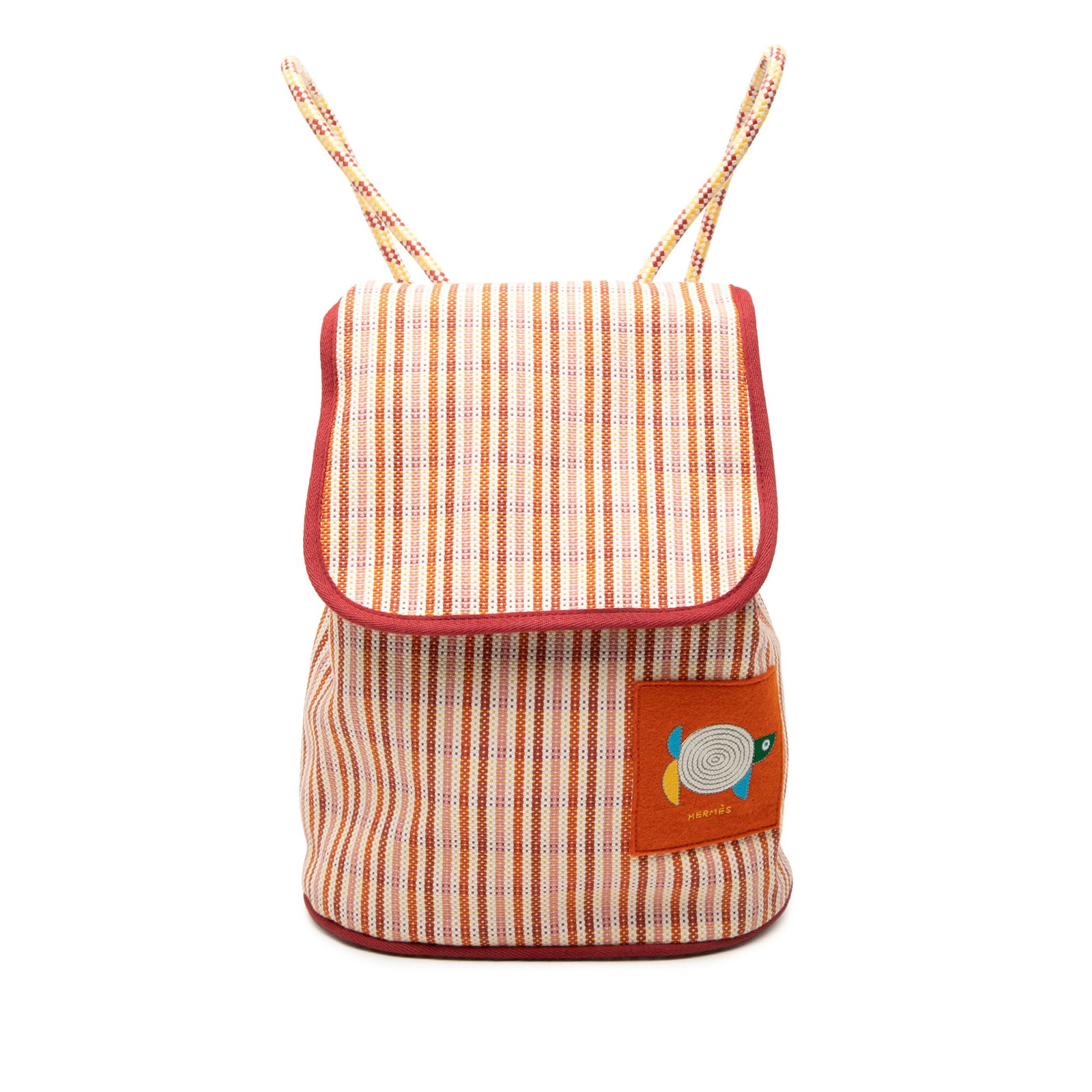 Hermes Animaux Nattes Orange Canvas Drawstring Backpack: Hermes Animaux Nattes Orange Canvas Drawstring Backpack Hermes Canvas Animaux Nattes backpack in orange fabric with an embroidered cotton canvas body. It features braided cotton and polyester back str