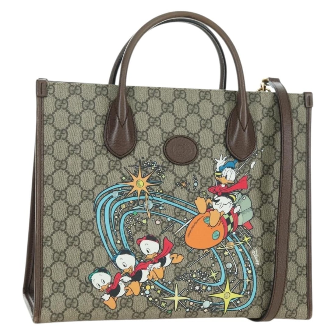 Gucci 648134 Donald Duck GG Supreme 2way handbag beige gold: Gucci 648134 Donald Duck GG Supreme 2way handbag beige gold Gucci GG Supreme Donald Duck hand bag in beige and gold, made in Italy from PVC leather and GG canvas. This 2-way bag comes with a shoulder 