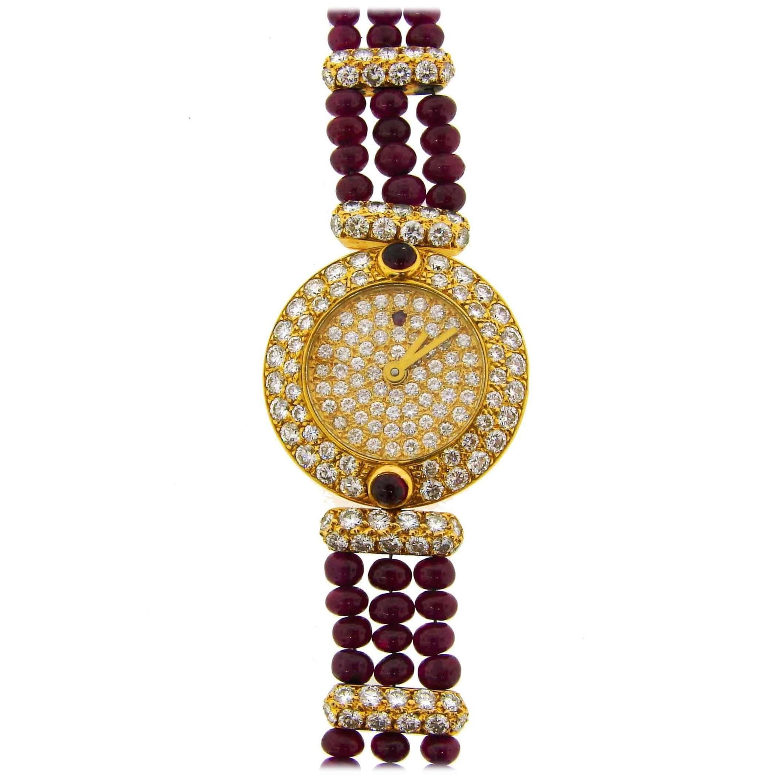 Boucheron diamond ruby quartz ladies wristwatch in 18k yellow gold: Boucheron diamond ruby quartz ladies wristwatch in 18k yellow gold Vintage lady's wristwatch by Boucheron in 18k yellow gold, featuring a round quartz watch face encrusted with round brilliant cut dia