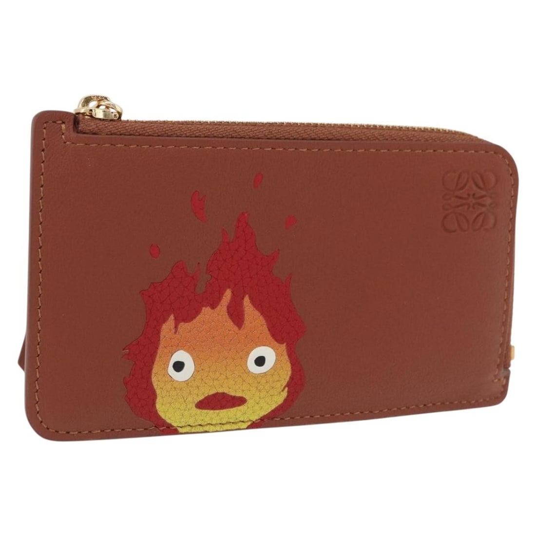 LOEWE Calcifer Leather Card Case Howl's Moving Castle Brown Red: LOEWE Calcifer Leather Card Case Howl's Moving Castle Brown Red LOEWE x Studio Ghibli Howl's Moving Castle card holder featuring a brown and red leather design with Calcifer motif. Made in Spain, this