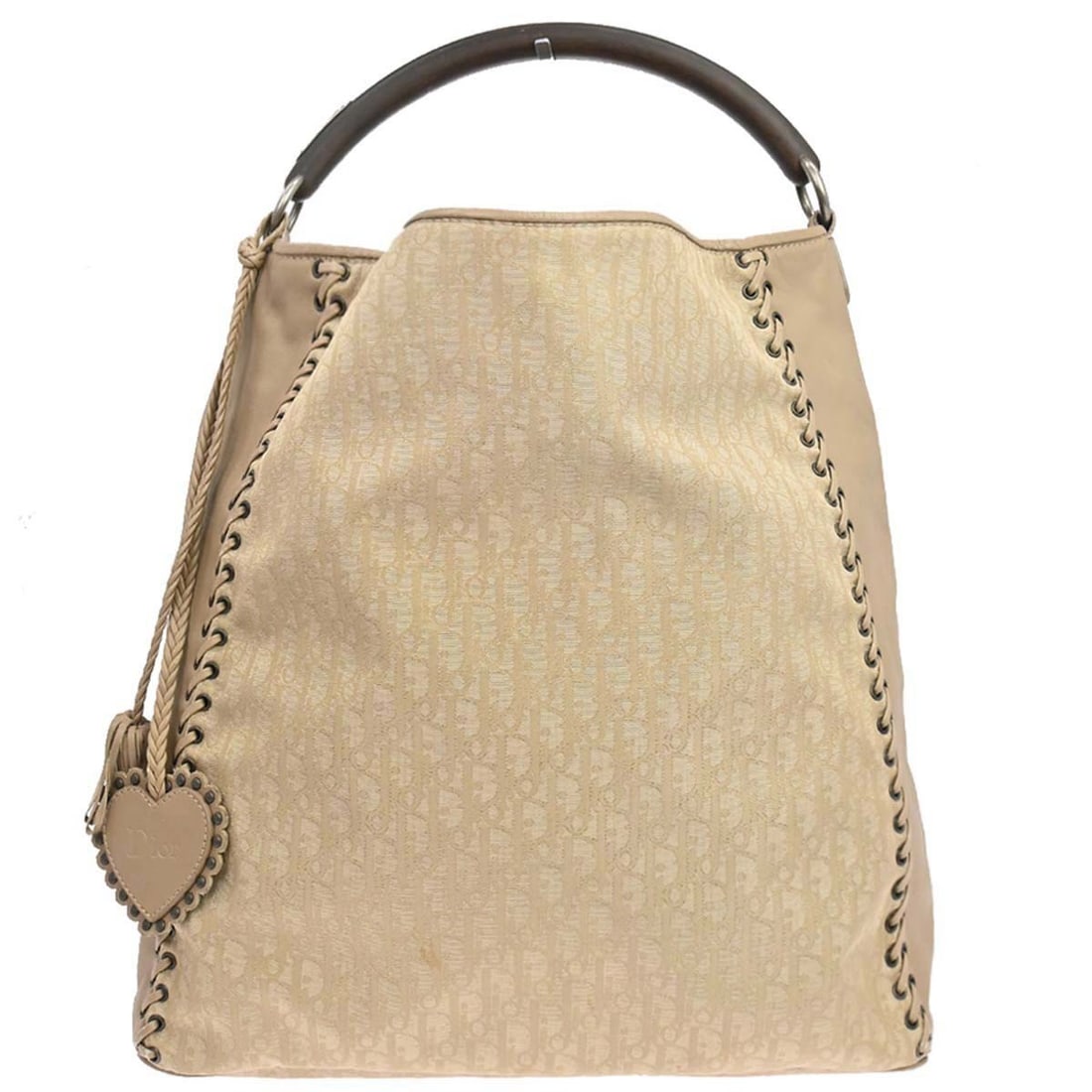 Dior Ethnic Trotter beige canvas leather hobo bag charm: Dior Ethnic Trotter beige canvas leather hobo bag charm Christian Dior Ethnic hobo handbag in beige Trotter canvas and leather with double handles, silver-tone hardware, logo accents, and interior and