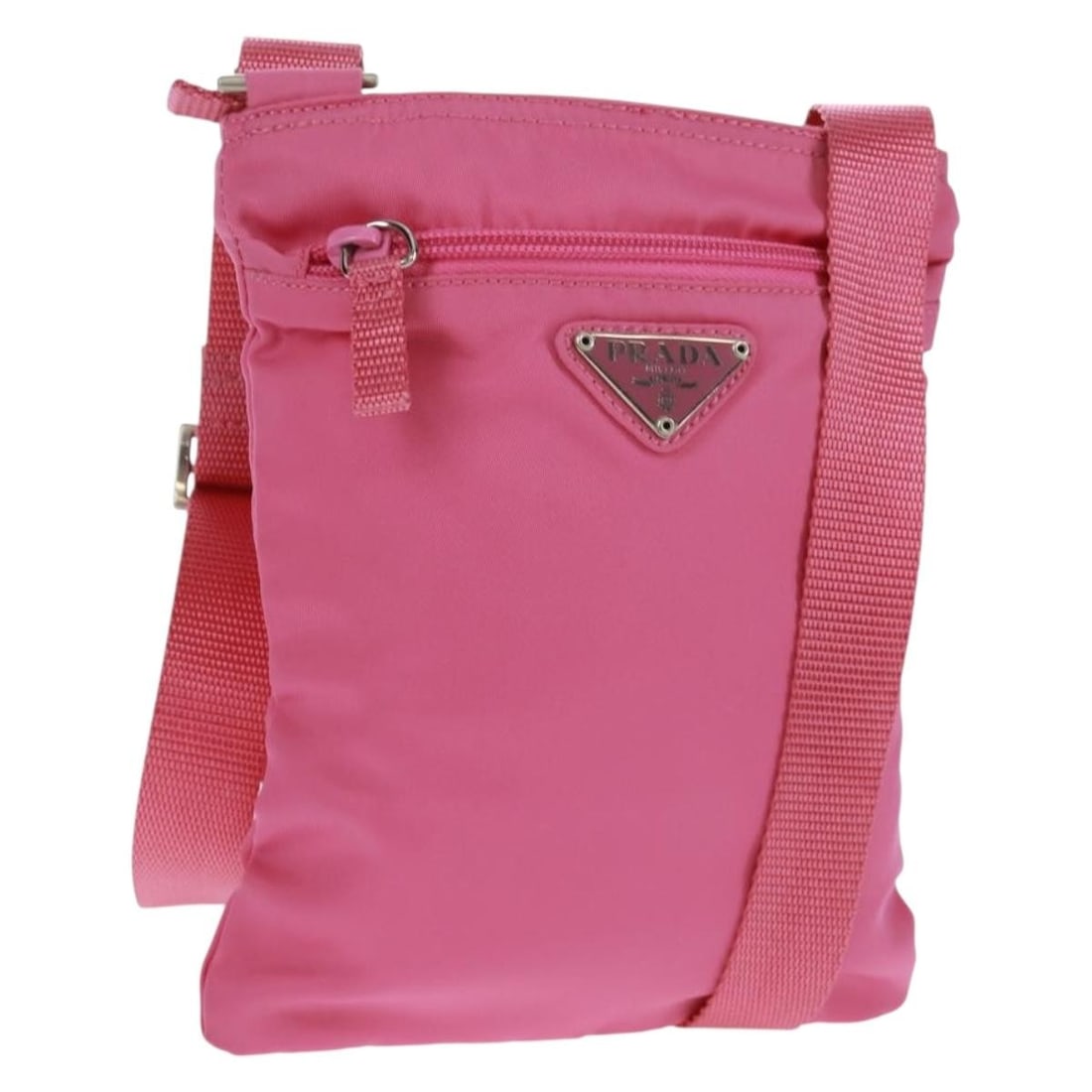 Prada Nylon Shoulder Bag in Pink Silver with Dust Bag: Prada Nylon Shoulder Bag in Pink Silver with Dust Bag Authentic Prada shoulder bag in pink and silver nylon with an adjustable shoulder strap. Made in Italy, this women's bag includes a dust bag. Cond