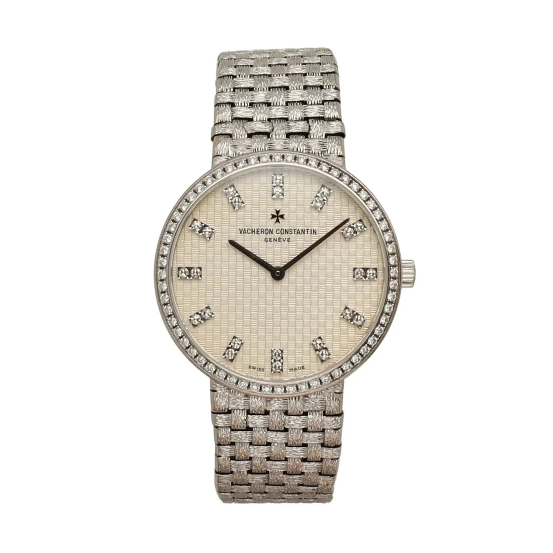Vacheron Constantin Patrimony manual 35 mm white gold diamond dial watch: Vacheron Constantin Patrimony manual 35 mm white gold diamond dial watch Vintage pre-owned Vacheron Constantin Patrimony wristwatch with a cream analog dial, diamond markers, and a diamond bezel. This