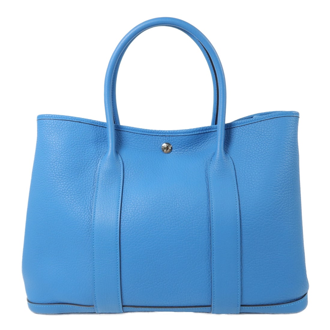 Hermes Garden Party PM Bleu Zanzibar Negonda Leather Handbag: Hermes Garden Party PM Bleu Zanzibar Negonda Leather Handbag Hermes Garden Party PM handbag in Bleu Zanzibar, made in France from Negonda leather and calfskin (cowhide). It features a hook button clos