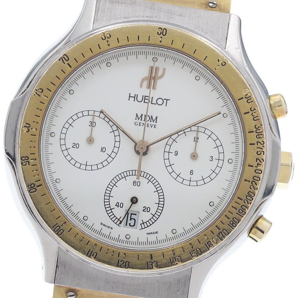 Hublot MDM 1620.2 mens quartz chronograph watch YG bezel: Hublot MDM 1620.2 mens quartz chronograph watch YG bezel Pre-owned Hublot MDM chronograph men's wristwatch with a quartz movement and white dial. This watch features a stainless steel and yellow gold 