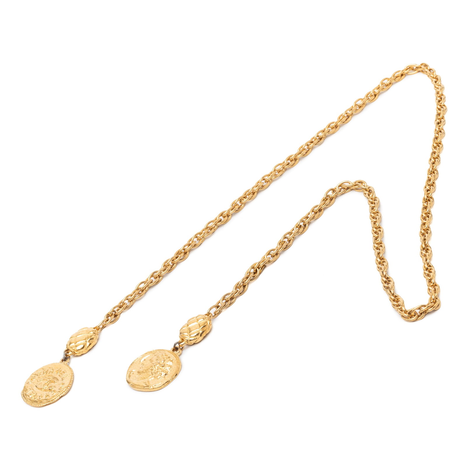 Chanel CC Medallion Gold Tone Metal Wrap Necklace: Chanel CC Medallion Gold Tone Metal Wrap Necklace This Chanel necklace features a gold-tone chain adorned with medallion embellishments. The piece is crafted from metal and showcases the brand's signa