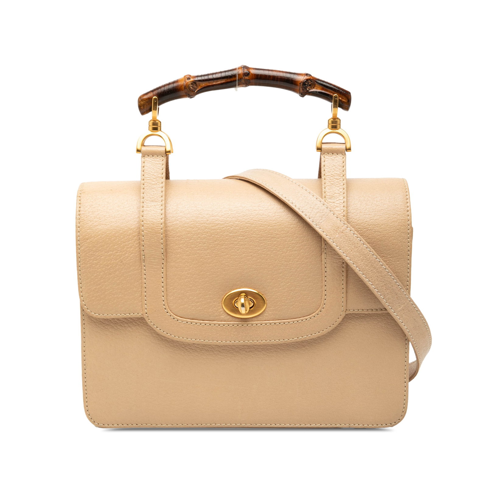 Gucci Bamboo Turnlock Satchel Beige Calfskin Leather Top Handle: Gucci Bamboo Turnlock Satchel Beige Calfskin Leather Top Handle Gucci calfskin top handle bag with a bamboo handle and turn-lock flap closure. This satchel includes a detachable flat leather strap and