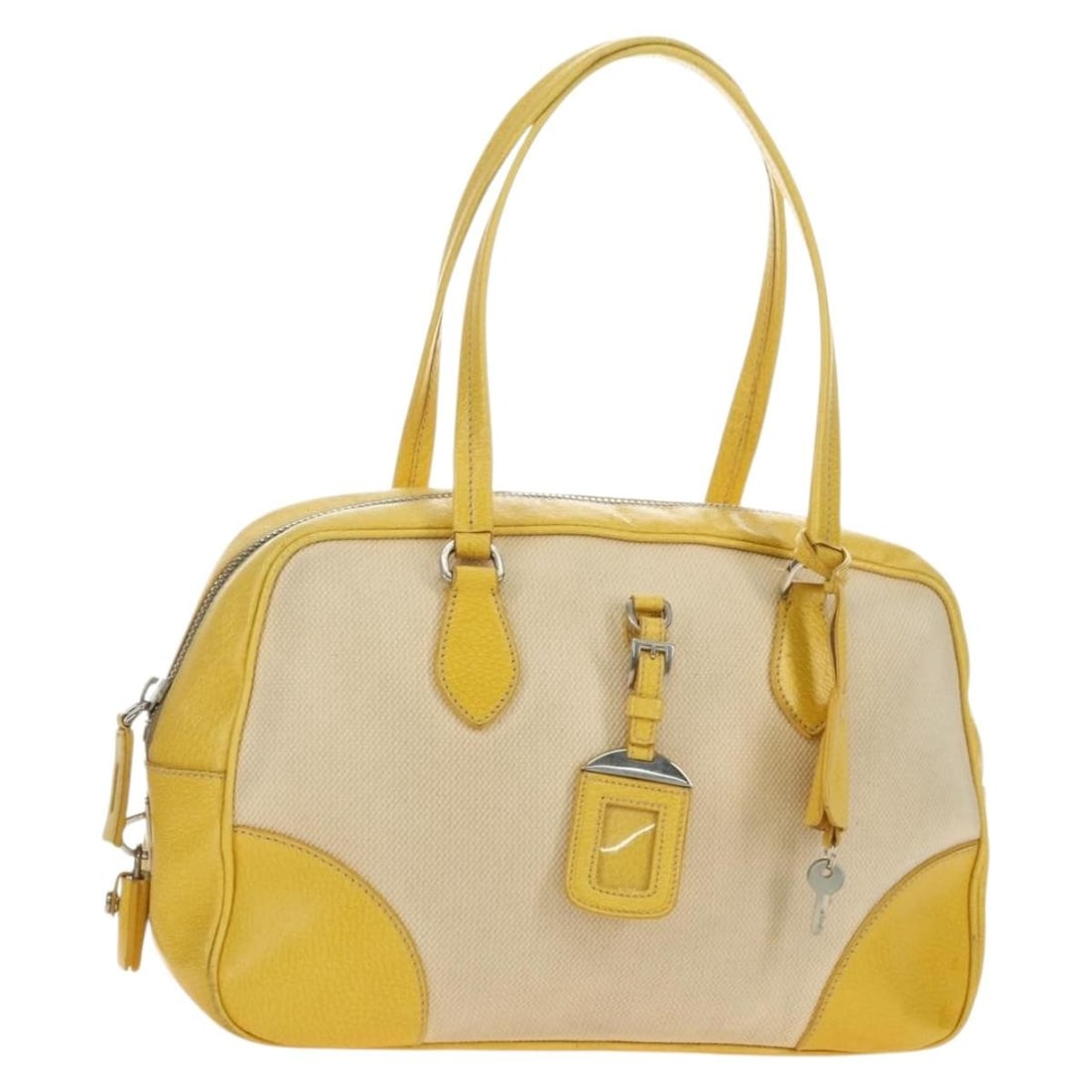 PRADA Canvas Handbag Beige Yellow Silver with Dust Bag Padlock: PRADA Canvas Handbag Beige Yellow Silver with Dust Bag Padlock Prada women's hand bag in beige, yellow, and silver canvas with leather trim. Made in Italy, this bag includes a dust bag, padlock, two k