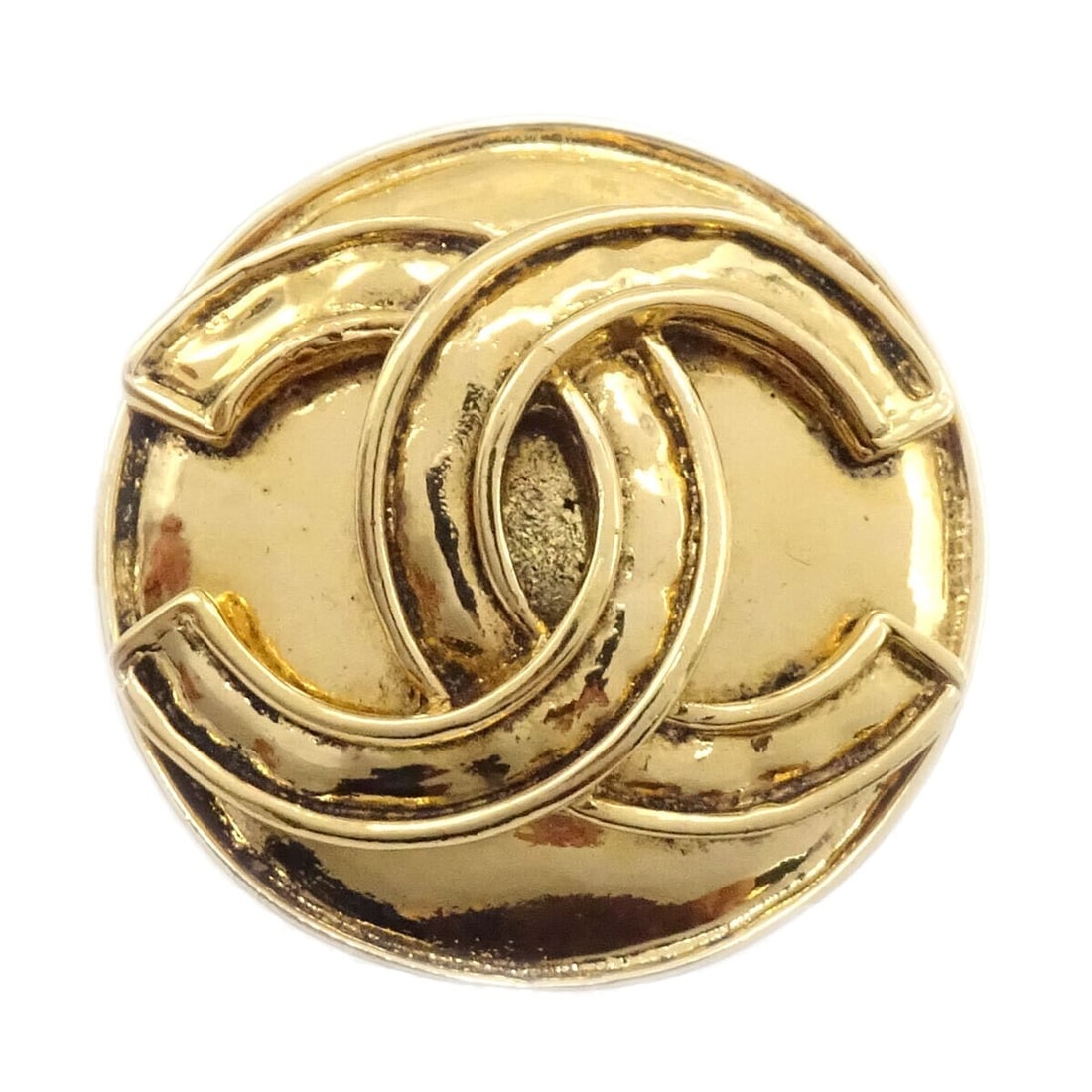 Chanel 94P Round Gold Plated Medallion Brooch: Chanel 94P Round Gold Plated Medallion Brooch Round Chanel medallion brooch pin in gold-plated metal, marked 94P. Made in France and presented with its box. Condition shows reasonable wear and tear wi