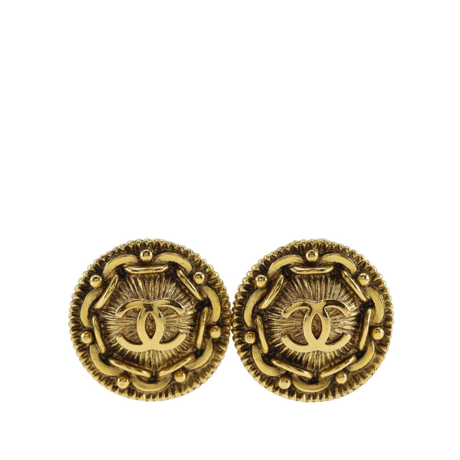 Chanel CC Medallion Clip Earrings Gold Plated Metal: Chanel CC Medallion Clip Earrings Gold Plated Metal Pair of Chanel CC medallion clip-on earrings in gold tone metal. This costume jewelry design features the iconic CC medallion motif with clip-on clo