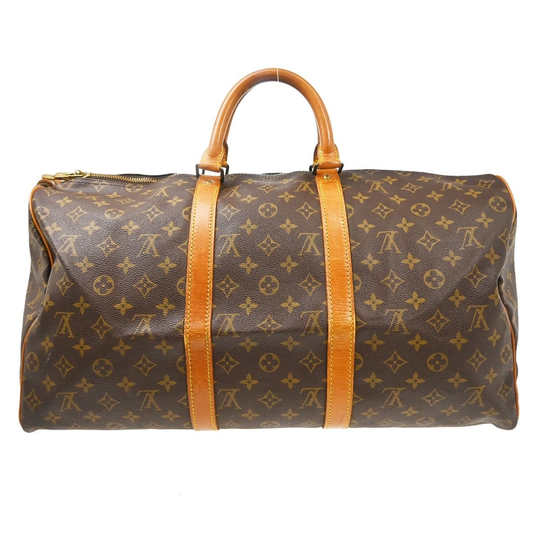 Louis Vuitton Keepall Brown Monogram Canvas Travel Bag: Louis Vuitton Keepall Brown Monogram Canvas Travel Bag Louis Vuitton Keepall in brown Monogram canvas. This unisex travel bag is made in France and remains functional with fair overall condition. Visi