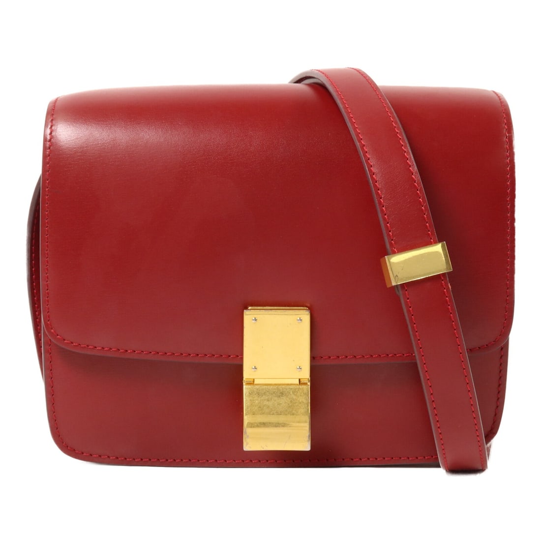 CELINE Classic Box Small Red Calfskin Shoulder Bag: CELINE Classic Box Small Red Calfskin Shoulder Bag Celine Classic Box Small shoulder bag in red calfskin leather with a structured silhouette and flap-front design. The interior includes two open comp