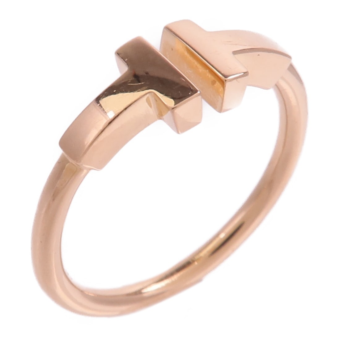 Tiffany Co T Wire Ring 18K Rose Gold Size 5.5: Tiffany Co T Wire Ring 18K Rose Gold Size 5.5 Tiffany & Co. T Wire ring in 18K pink gold with a minimalist design and no main stone. Includes the storage box and case. Condition is listed as AB: Very 