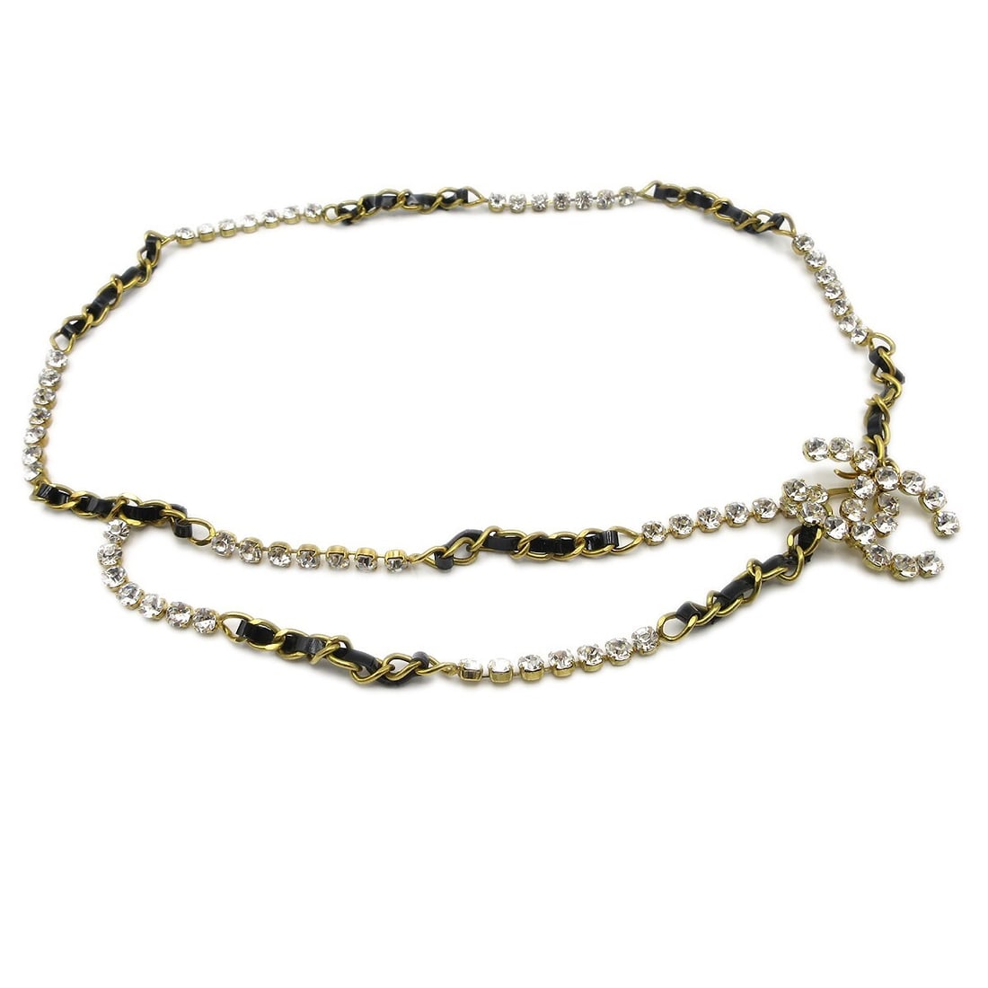 CHANEL 95P adjustable gold tone chain belt with rhinestones: CHANEL 95P adjustable gold tone chain belt with rhinestones Gold-tone Chanel chain belt for women with rhinestone accents. It is adjustable, features a chain design, and reflects a 90s theme. Made in 