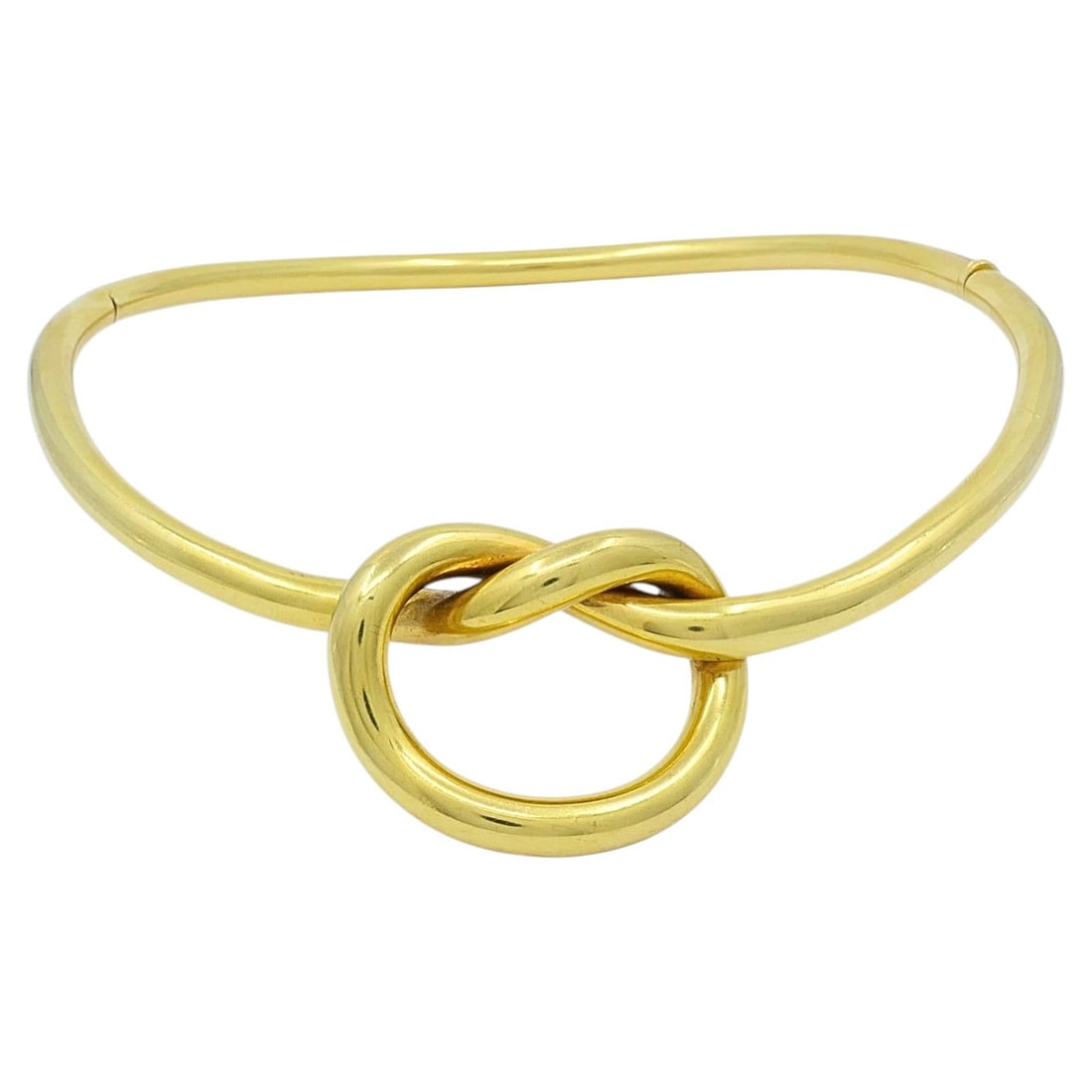 18k Gold Hinged Collar Necklace with Love Knot 15 in: 18k Gold Hinged Collar Necklace with Love Knot 15 in Vintage 18k gold collar necklace featuring a sculptural love knot at the front and a hinged design for secure wear. The hollow tube form and smooth