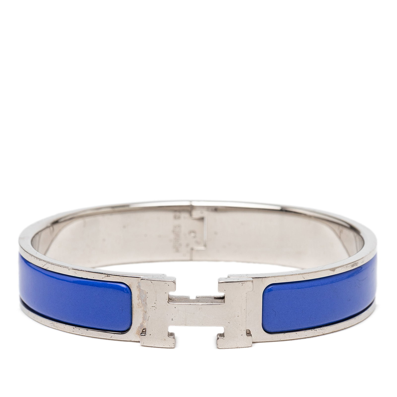 Hermes Clic H GM narrow enamel bracelet blue palladium: Hermes Clic H GM narrow enamel bracelet blue palladium Hermes Narrow Enamel Clic H Bracelet GM with an enamel body, palladium-plated metal accents, and a metal clasp closure. Includes the dust bag and