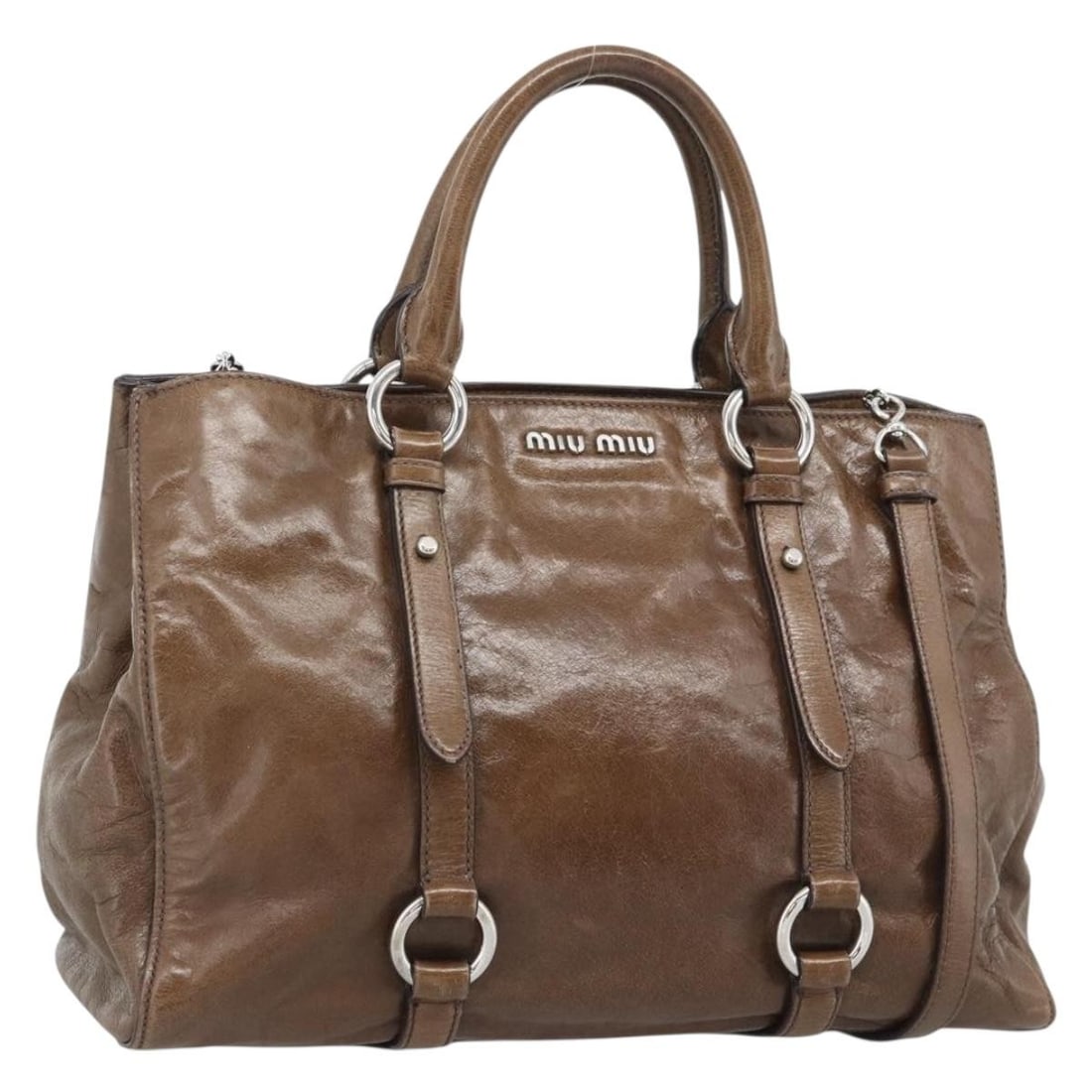 Miu Miu Brown Leather 2way Handbag with Shoulder Strap: Miu Miu Brown Leather 2way Handbag with Shoulder Strap Brown leather 2-way handbag with silver-tone accents and an included shoulder strap. Made in Turkey, this women's bag can be carried by the handl