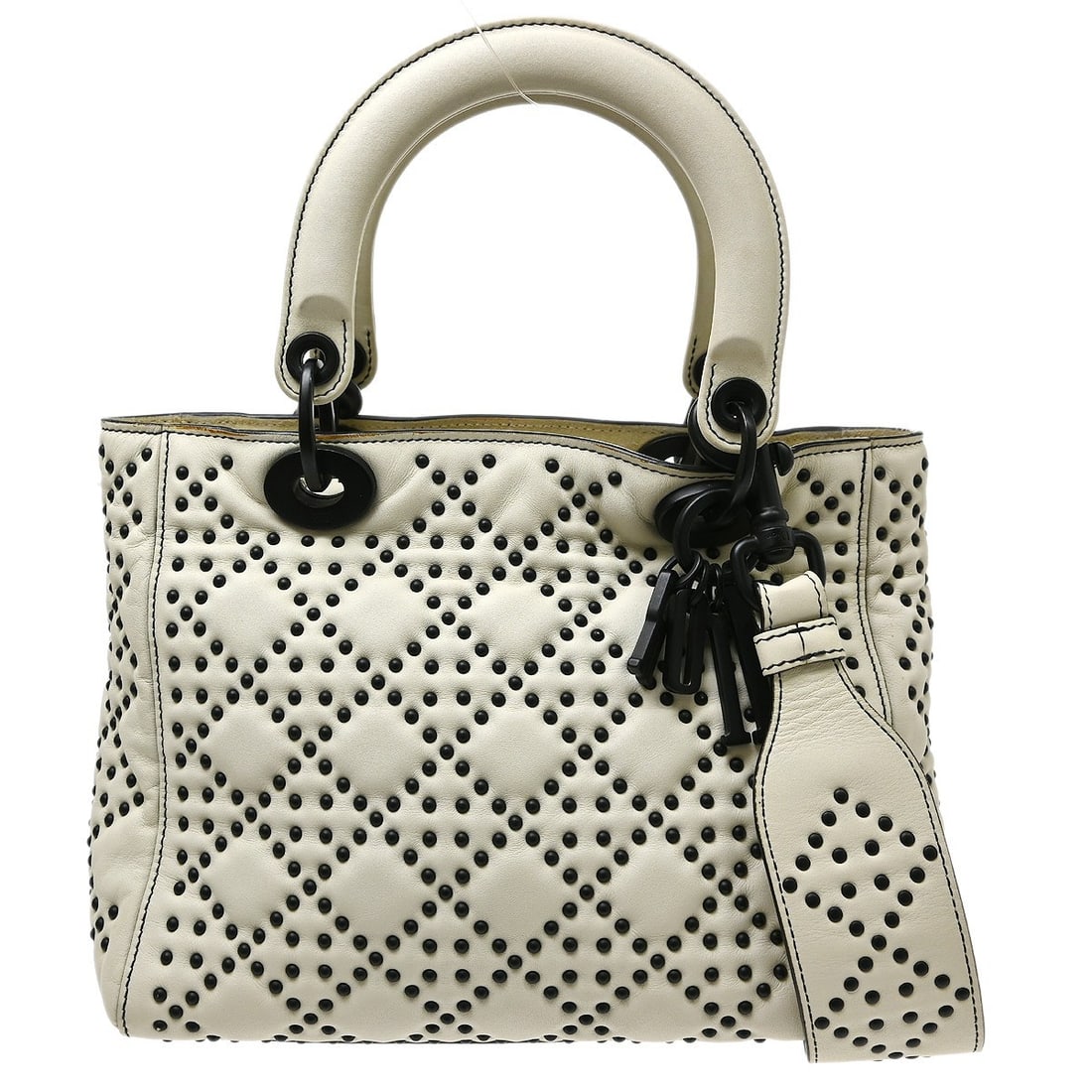 Christian Dior Supple Lady Dior white leather handbag: Christian Dior Supple Lady Dior white leather handbag Christian Dior Supple Lady Dior Cannage studded handbag in white leather. This women's bag is made in Italy and remains in good condition overall,