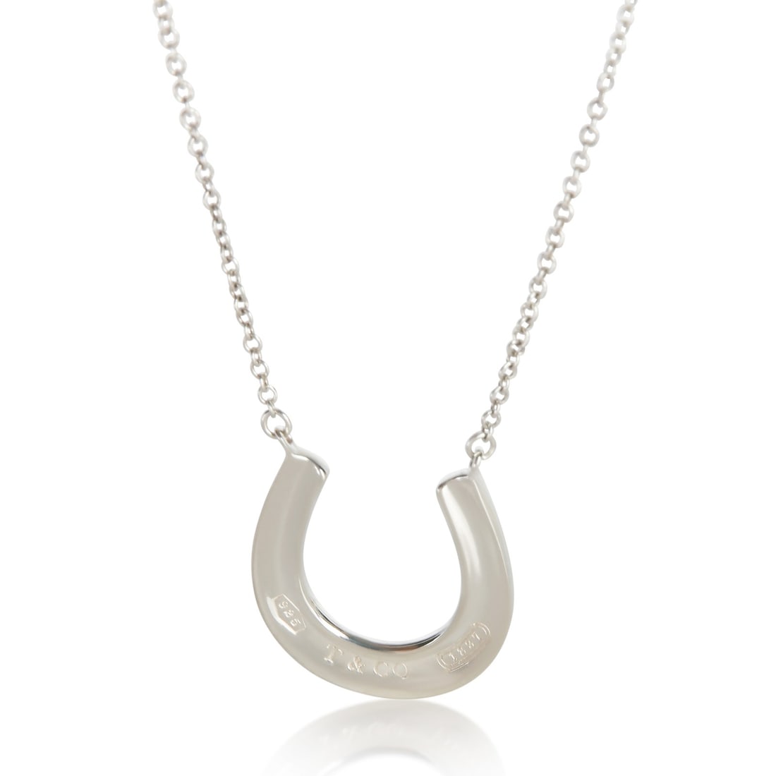 Tiffany Co 1837 Horseshoe Sterling Silver Pendant with Box Pouch: Tiffany Co 1837 Horseshoe Sterling Silver Pendant with Box Pouch Pre-owned Tiffany & Co. 1837 Horseshoe pendant in sterling silver. This unisex pendant comes with the original box and pouch and featur