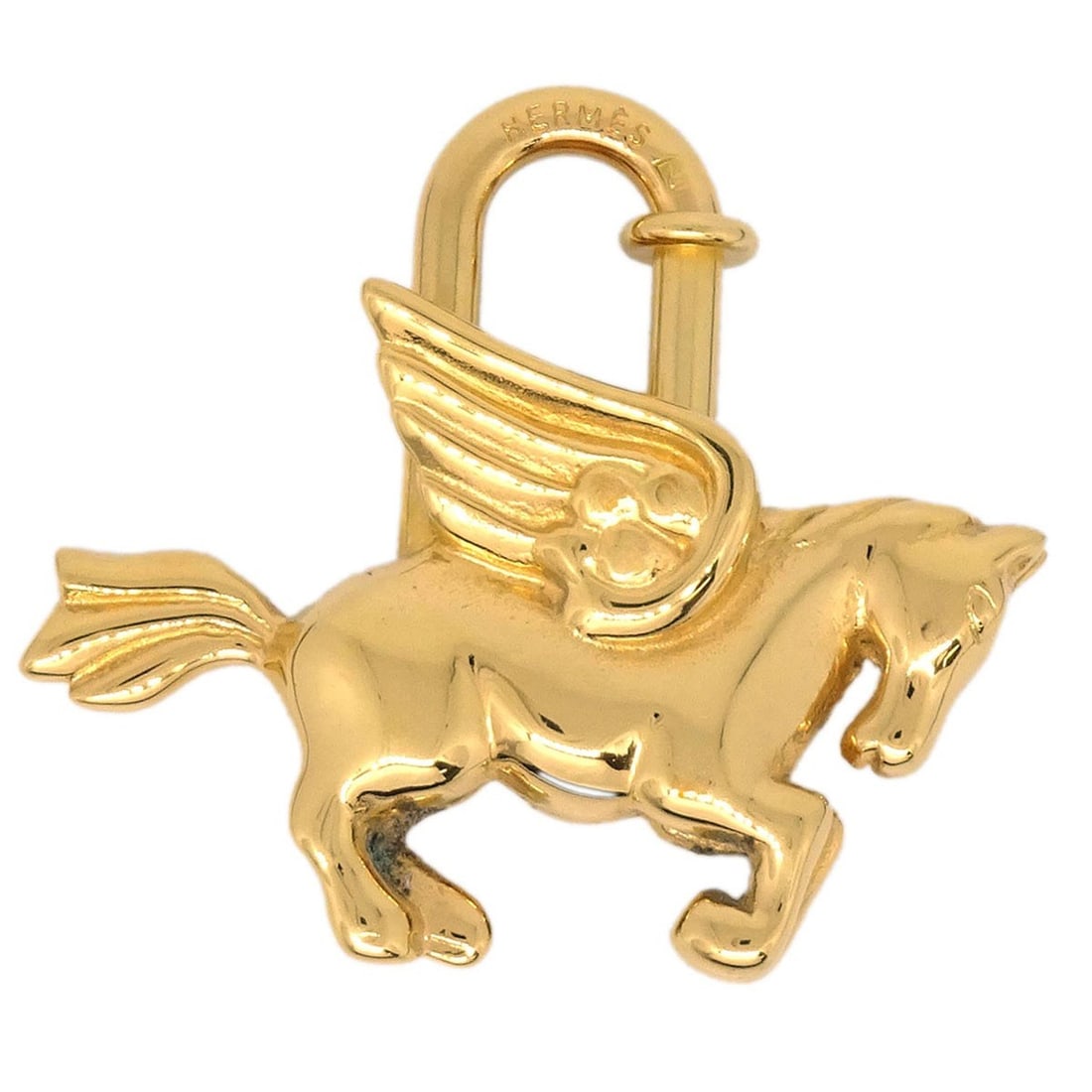 Hermes Le Cheval Pegasus Cadena Small Gold Plated Charm 1993: Hermes Le Cheval Pegasus Cadena Small Gold Plated Charm 1993 Vintage Hermes Le Cheval Pegasus Cadena charm from 1993 in gold-plated metal. This small unisex charm is made in France and remains in very