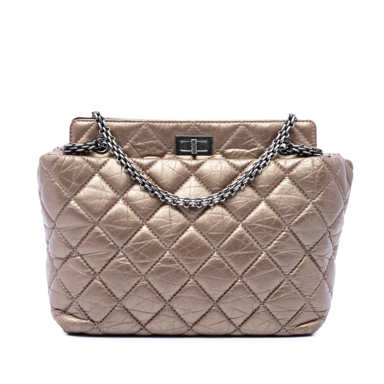 Chanel Reissue 2.55 Metallic Aged Calfskin Quilted Tote Bag: Chanel Reissue 2.55 Metallic Aged Calfskin Quilted Tote Bag Quilted Chanel Reissue 2.55 tote crafted in metallic aged calfskin with chain link straps and an open top with twist lock closure. The inter