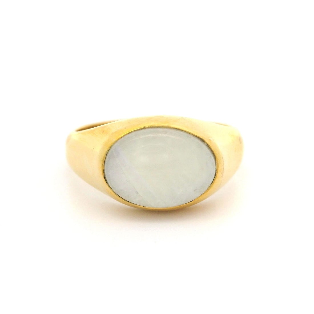 Gold Plated Sterling Silver Rainbow Moonstone Solitaire Ring: Gold Plated Sterling Silver Rainbow Moonstone Solitaire Ring This stunning silver gold plated cabochon rainbow moonstone ring features a signet style with an elegant sideway solitaire bezel setting. T