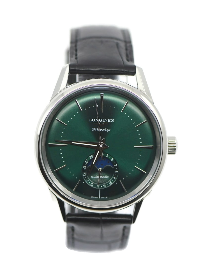 Flagship Green Dial Automatic Wristwatch by Longines with Box and Papers: Flagship Green Dial Automatic Wristwatch by Longines with Box and Papers This Longines Flagship wristwatch features a stainless steel case paired with a green analog dial. Designed for men, it operate