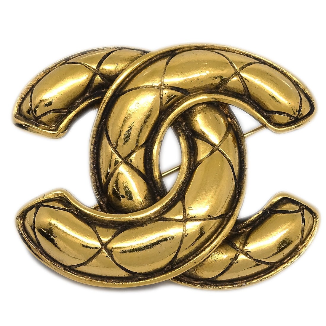 CHANEL Quilted CC Gold Plated Logo Brooch Pin: CHANEL Quilted CC Gold Plated Logo Brooch Pin Gold-plated Chanel brooch pin featuring the quilted interlocking CC logo design. Made in France, this medium brooch comes with its box. Condition is very 