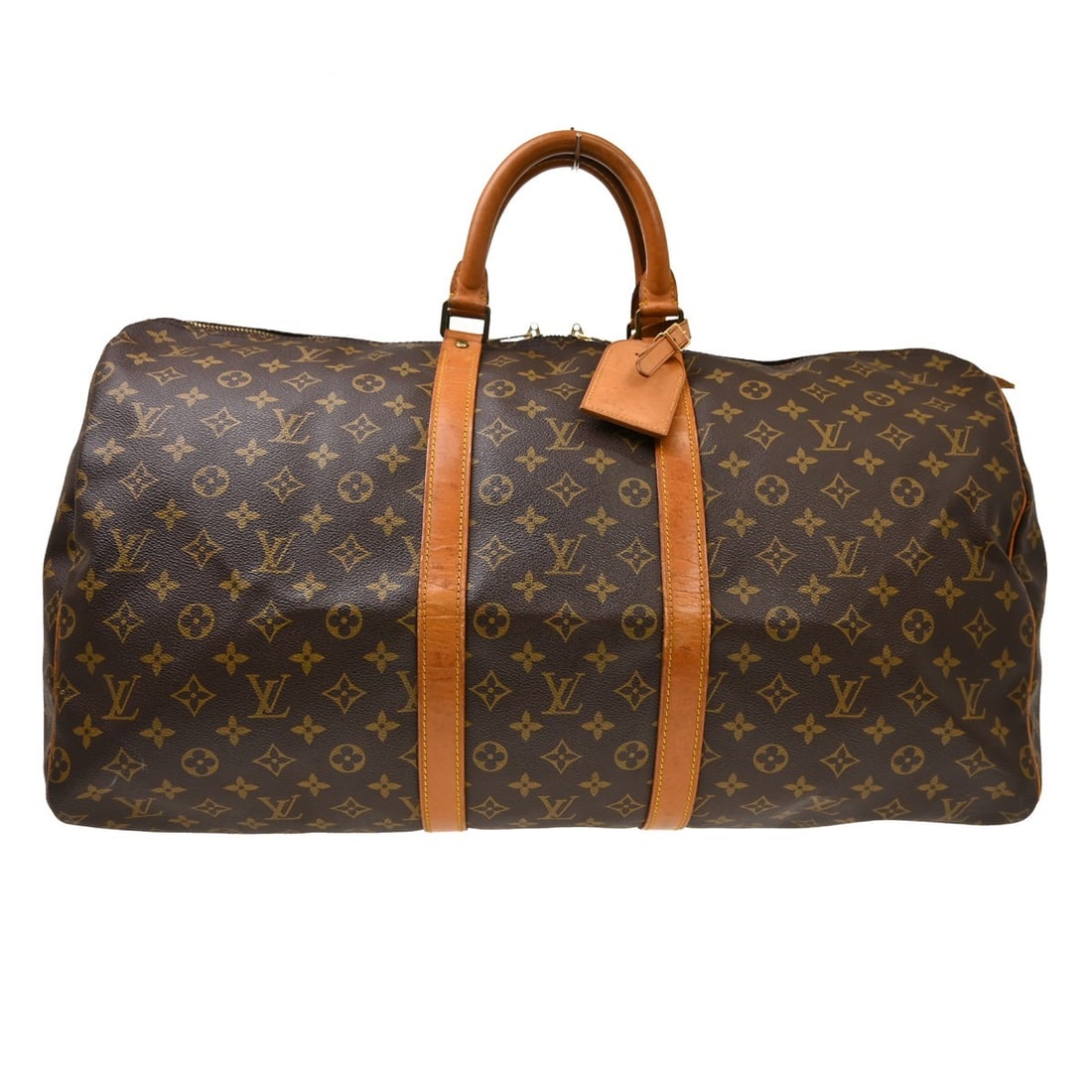 Louis Vuitton Keepall unisex brown canvas travel bag: Louis Vuitton Keepall unisex brown canvas travel bag Louis Vuitton Keepall unisex travel bag in brown canvas. The bag is described as in good condition, with light scuffs, natural patina, light stains