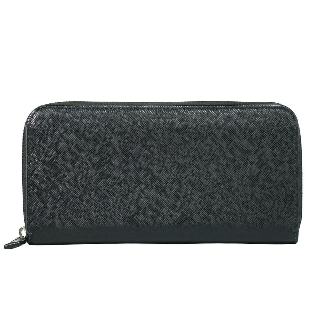 Prada Saffiano black leather wallet made in Italy: Prada Saffiano black leather wallet made in Italy This Prada Saffiano wallet for women features black leather with a textured finish. It measures 20 cm wide, 10 cm high, and 2.5 cm deep. The wallet sh