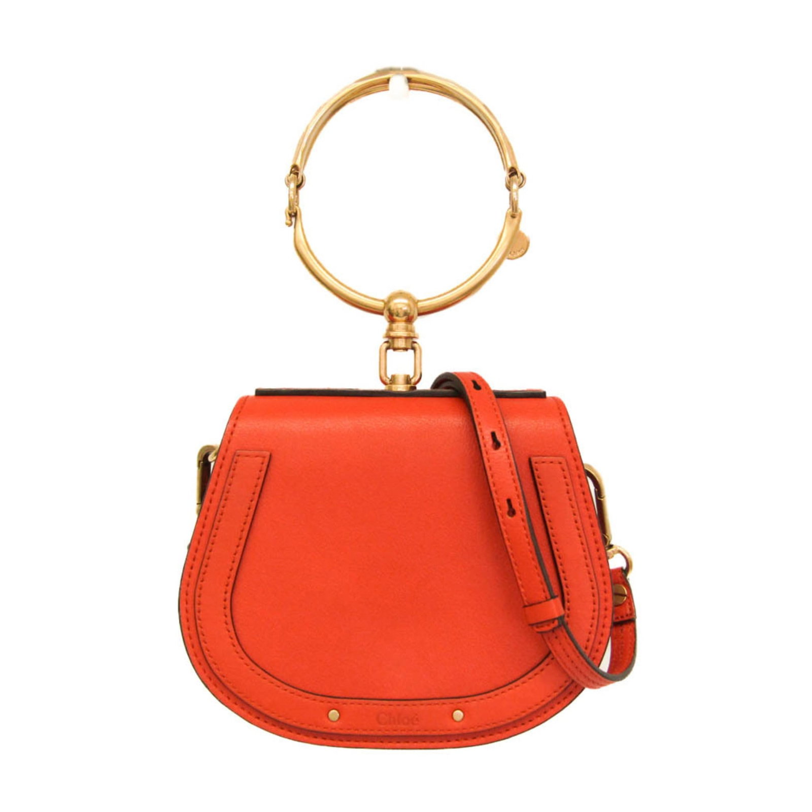 Chloe Nile orange leather crossbody bag 19cm x 16cm x 7cm: Chloe Nile orange leather crossbody bag 19cm x 16cm x 7cm The Chloe Nile Crossbody Bag is crafted from orange leather and designed for women. Made in Italy, this bag features a structured silhouette a