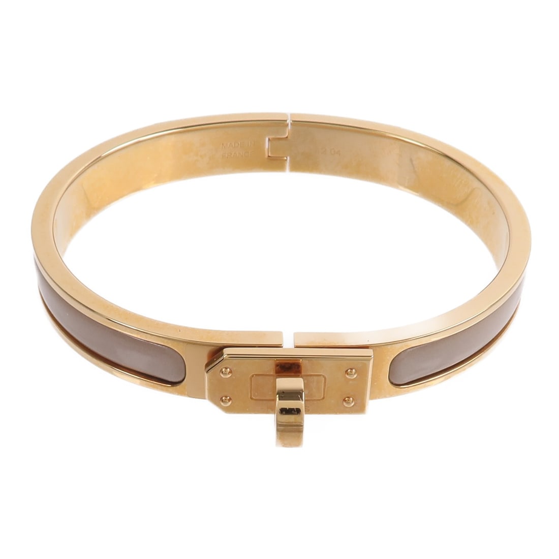 Hermes Mini Clic Kelly enamel bracelet Marron Glace: Hermes Mini Clic Kelly enamel bracelet Marron Glace Mini Clic Kelly bracelet in marron glace with enamel and metal construction. Includes storage bags. Condition is AB: Very Good. Specifications Item 