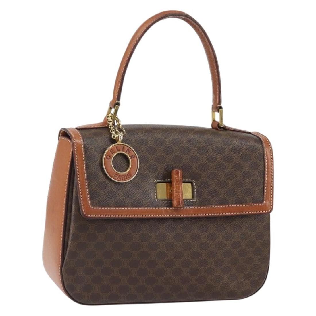 Celine Macadam Vintage Convertible Top Handle Brown PVC Bag: Celine Macadam Vintage Convertible Top Handle Brown PVC Bag This Celine vintage convertible top handle bag features the iconic Macadam coated canvas in brown PVC. Designed for women, it offers a versa