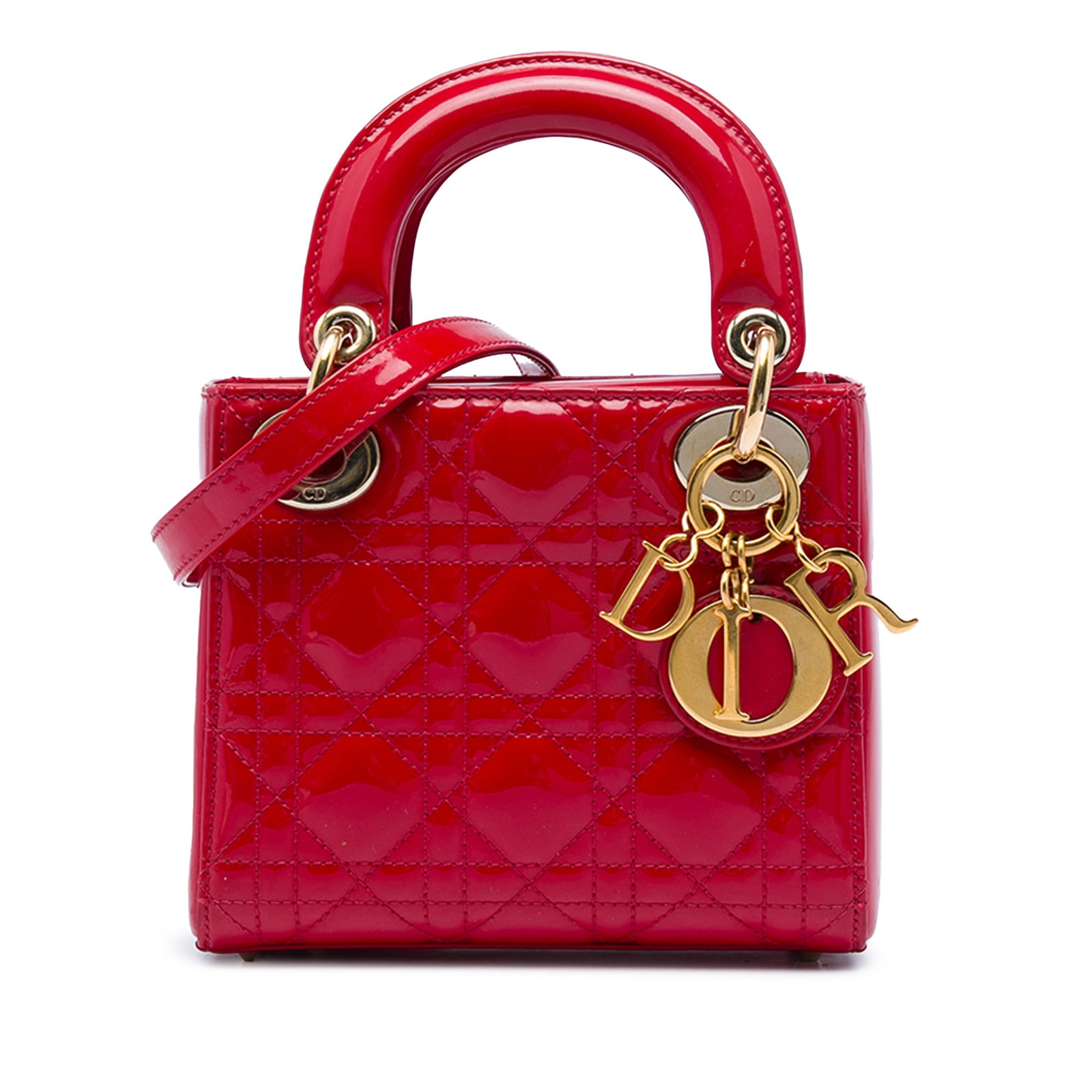 Dior Lady Dior Mini Cannage Patent Leather Bag Red: Dior Lady Dior Mini Cannage Patent Leather Bag Red This Lady Dior bag features a quilted patent leather body with flat top handles, a detachable shoulder strap, a top fold-in flap closure, and an inte