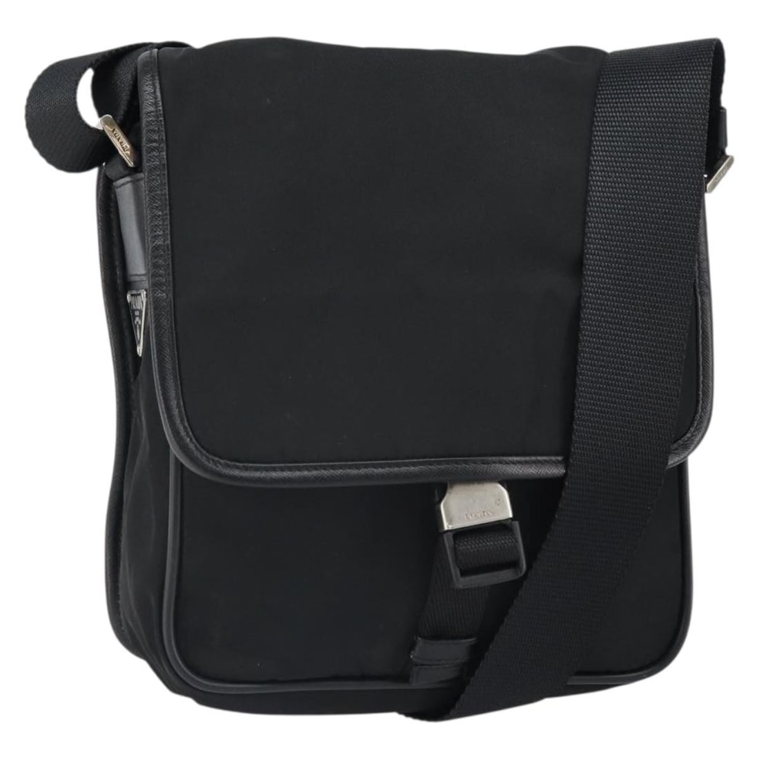 Prada Black Nylon Shoulder Bag with Silver Tone Hardware: Prada Black Nylon Shoulder Bag with Silver Tone Hardware This PRADA shoulder bag features a black nylon exterior with silver-tone accents. The bag offers a practical design with adjustable shoulder st