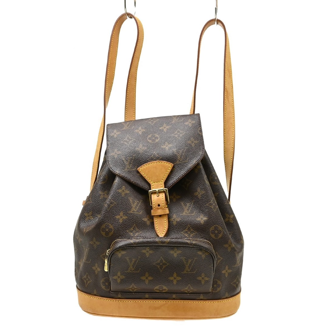 Louis Vuitton Montsouris MM Monogram Canvas Backpack M51136: Louis Vuitton Montsouris MM Monogram Canvas Backpack M51136 Vintage Louis Vuitton Montsouris MM backpack in brown Monogram canvas with leather trim. This medium backpack features a flap buckle and dra