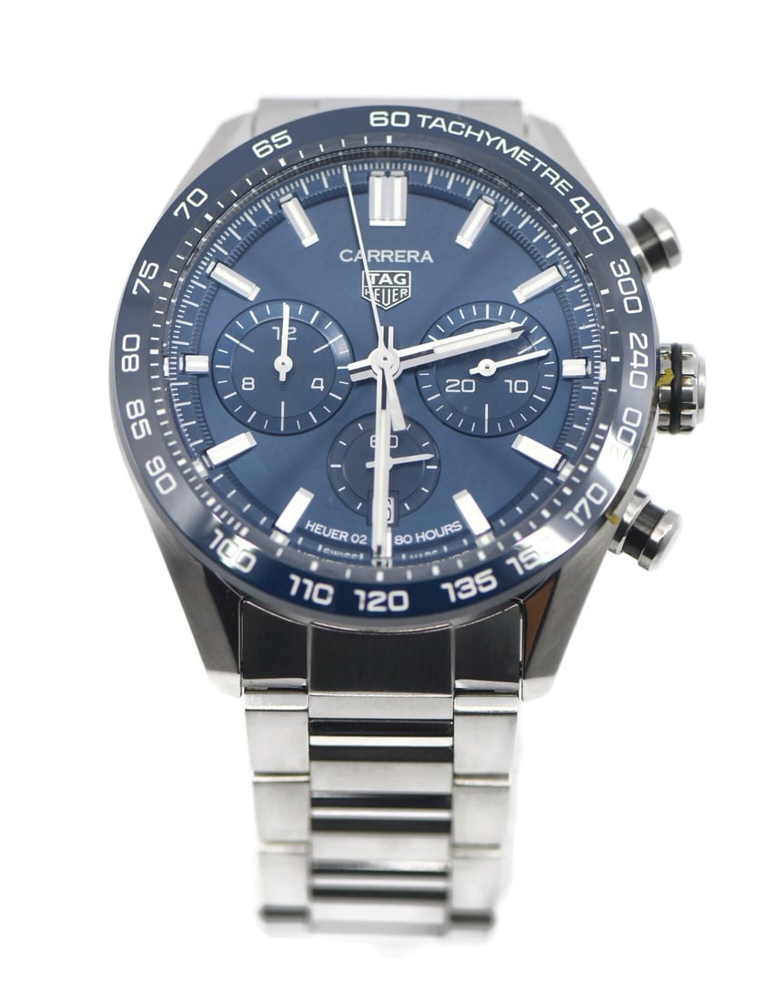 TAG Heuer Carrera CBN2A1A mens automatic chronograph watch: TAG Heuer Carrera CBN2A1A mens automatic chronograph watch Pre-owned TAG Heuer Carrera chronograph wristwatch with a blue dial, blue tachymeter bezel, and stainless steel case and bracelet. This autom